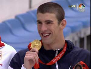 OLYMPICS-Phelps-with-gold.jpg