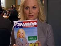 parks-and-rec-leslie-w-book.jpg