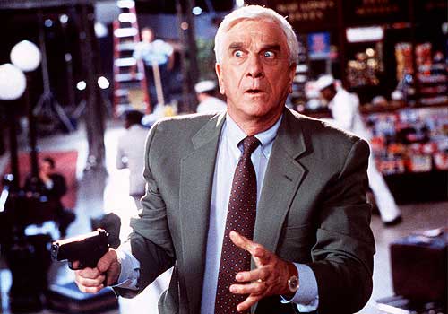 leslie-nielsen-with-gun.jpg