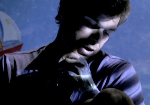 dexter feeds baby son.jpg